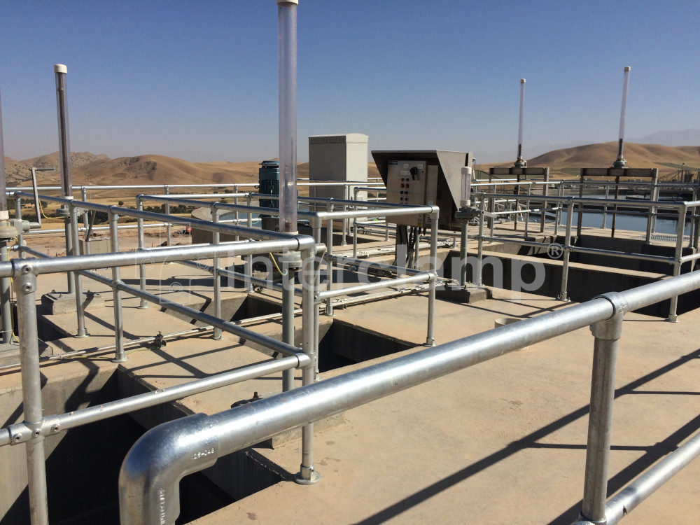 Interclamp key clamp fittings chosen for building safety handrails and balustrades at a Kurdistan water treatment facility, providing reliable protection for employees.